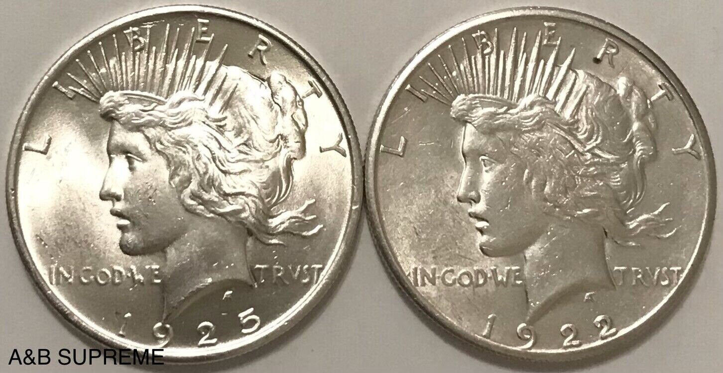 Two (2) 1921-1935 Peace Dollar Gem Bu & Au-Bu 90% Silver